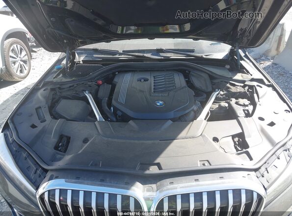 WBA7T2C05LCD68707 2020 BMW OTHER Черный Вид сзади