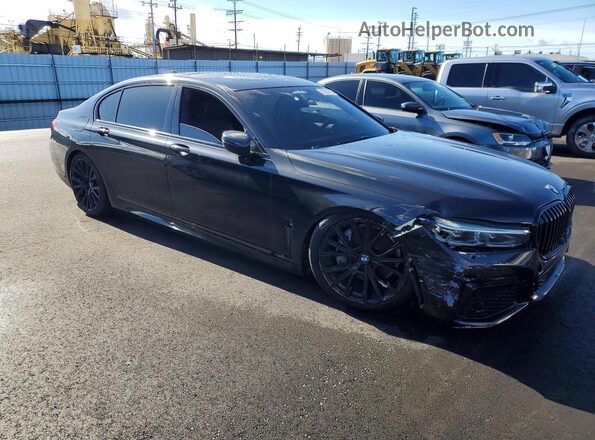 WBA7T2C05MCF41157 2021 BMW OTHER Черный Передняя правая четверть