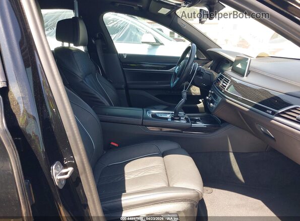 WBA7U2C04MCG17061 2021 BMW OTHER Черный Вид салона спереди