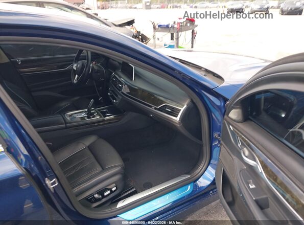 WBA7U2C09MCF58587 2021 BMW OTHER Blue Vista interior delantera