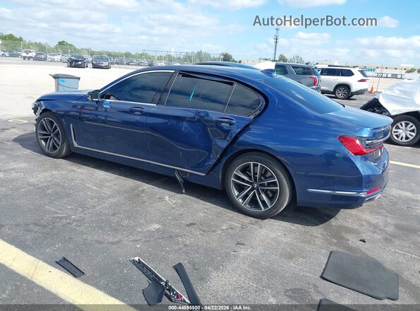 WBA7U2C09MCF58587 2021 BMW OTHER Blue Trasero izquierdo