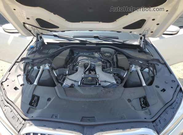WBA7U2C17MCE80416 2021 BMW OTHER White Vista interior trasera