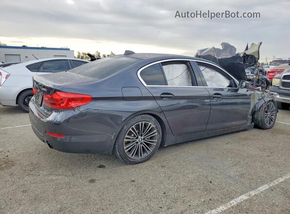 WBAJA5C54KWW29294 2019 BMW OTHER Gray Trasero derecho