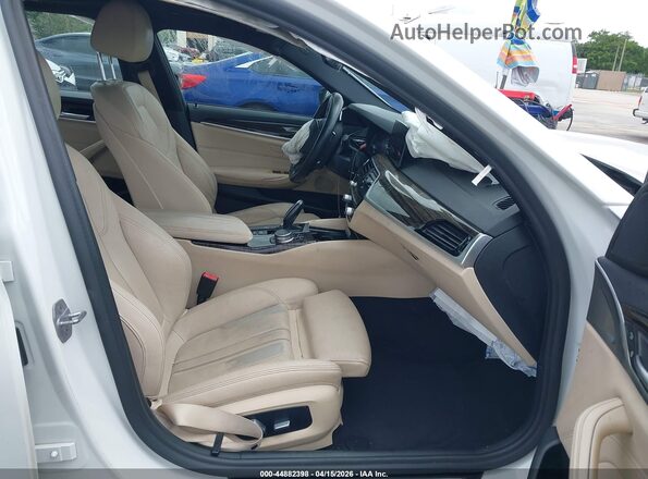 WBAJB1C03LCE08673 2020 BMW 5 SERIES Белый Вид салона спереди