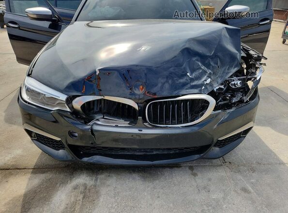 WBAJB9C56JB036627 2018 BMW M5 Black უკანა სალონის ხედი