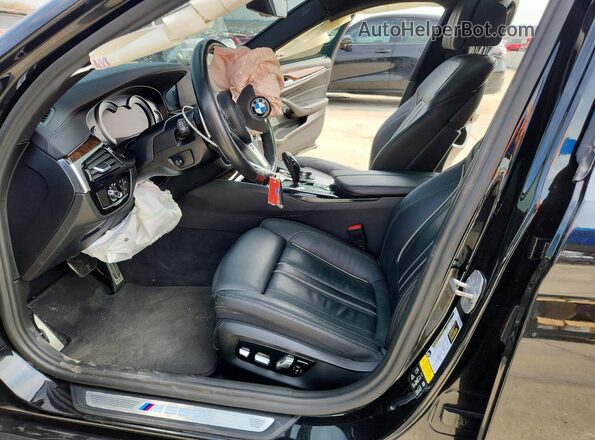 WBAJB9C56JB036627 2018 BMW M5 Black წინა სალონის ხედი