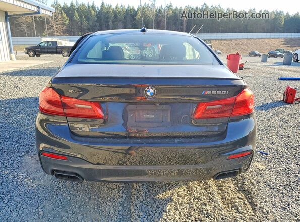 WBAJS7C06LCD00163 2020 BMW M5 Black Vista trasera