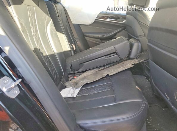 WBAJS7C06LCD00163 2020 BMW M5 Black Vista de los asientos traseros