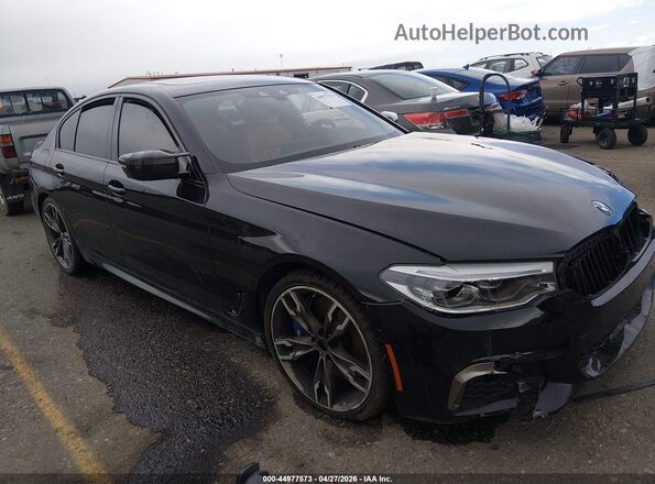WBAJS7C06LCE09366 2020 BMW OTHER Black Front right