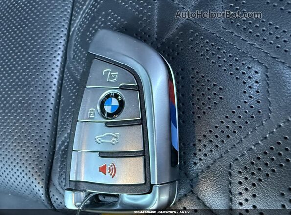 WBSAE0C07PCL08883 2023 BMW M8 Orange Widok deski rozdzielczej