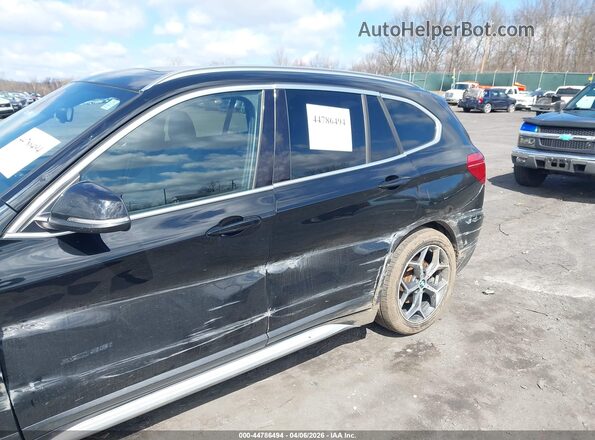 WBXHT3C30H5F73664 2017 BMW X1 Black 