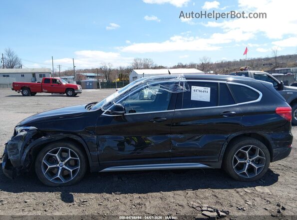 WBXHT3C30H5F73664 2017 BMW X1 Black Widok wnętrza 360 stopni