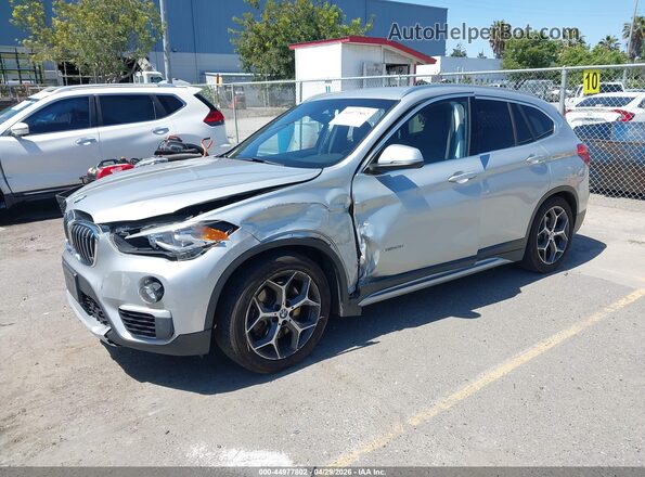 WBXHT3C31GP886433 2016 BMW X1 Silver წინა მარცხენა ხედი სამი მეოთხედიდან