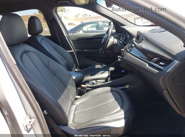 WBXHT3C31GP886433 2016 BMW X1 Silver წინა სალონის ხედი