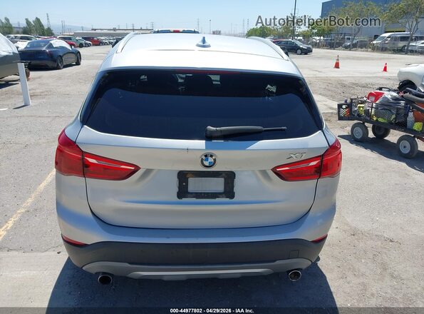 WBXHT3C31GP886433 2016 BMW X1 Silver 