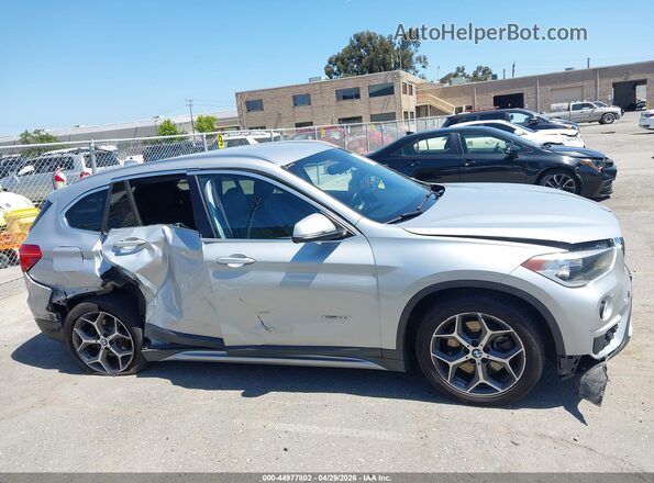 WBXHT3C31GP886433 2016 BMW X1 Silver უკანა სალონის ხედი