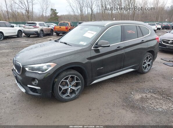 WBXHT3C31H5F78890 2017 BMW X1 Коричневый Передняя левая четверть
