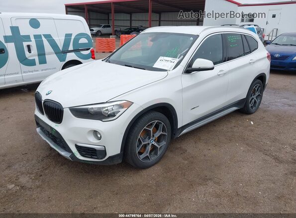 WBXHT3C31J5F90169 2018 BMW X1 White Vista tres cuartos delantera izquierda