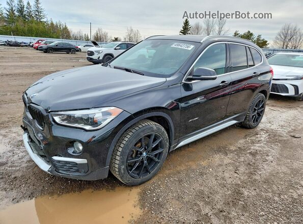WBXHT3C32H5F69762 2017 BMW X1 Black Przód lewy