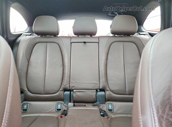 WBXHT3C32H5F69762 2017 BMW X1 Black Widok tylnych siedzeń