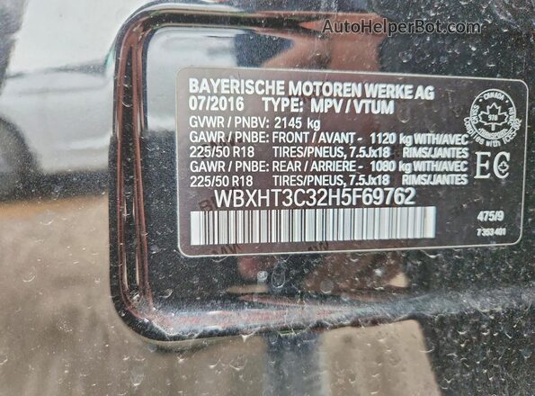 WBXHT3C32H5F69762 2017 BMW X1 Black Widok naklejki z numerem VIN