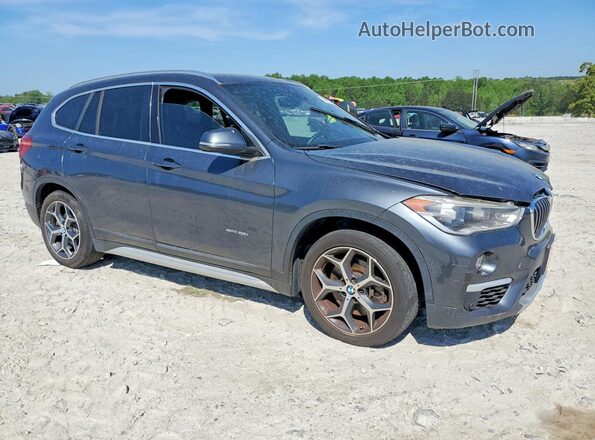 WBXHT3C33G5E55882 2016 BMW X1 Серый Передняя правая четверть