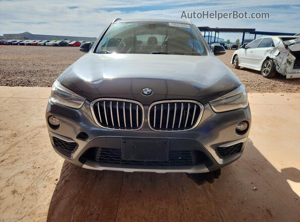 WBXHT3C33GP883775 2016 BMW X1 Gray Вид спереду