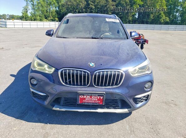 WBXHT3C34H5F84053 2017 BMW X1 Blue Vista frontal
