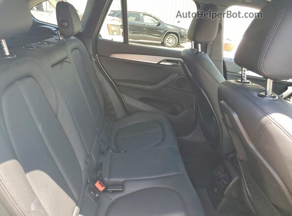 WBXHT3C35G5E56192 2016 BMW X1 White Widok wnętrza z tyłu