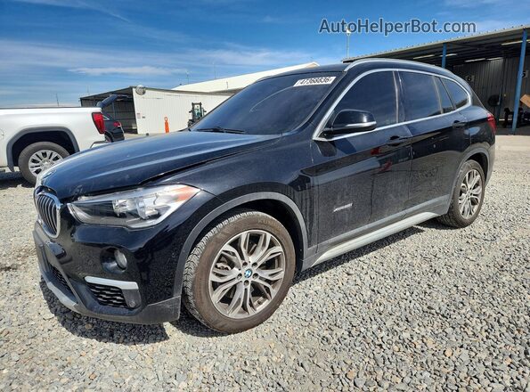 WBXHT3C36H5F81798 2017 BMW X1 Черный Передняя левая четверть