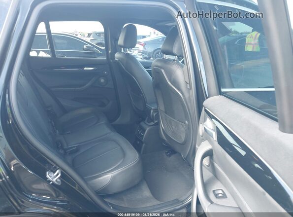 WBXHT3C38G5E52850 2016 BMW X1 Black Вид наклейки з VIN-кодом
