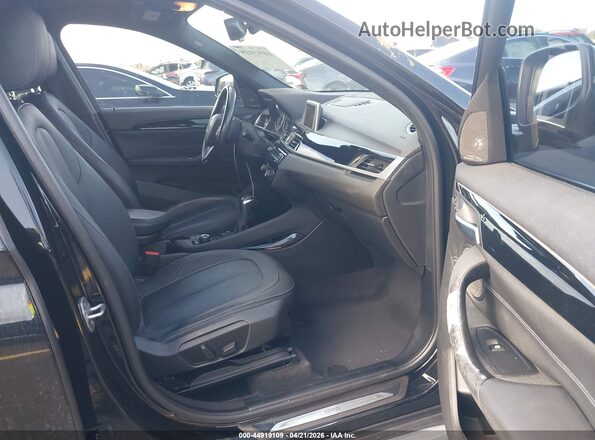 WBXHT3C38G5E52850 2016 BMW X1 Black Вид салону спереду