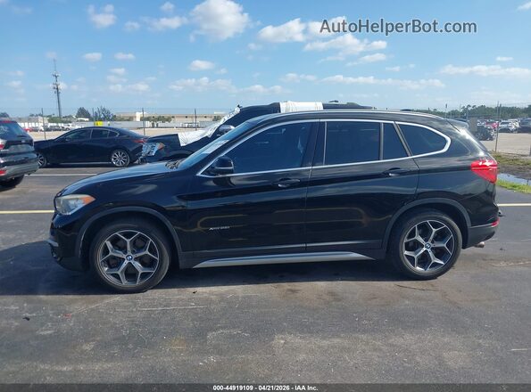 WBXHT3C38G5E52850 2016 BMW X1 Black Панорамний вид салону 360°