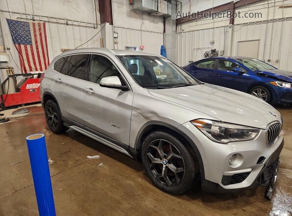 WBXHT3C38G5E56512 2016 BMW X1 Серебряный Передняя правая четверть