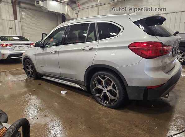 WBXHT3C38G5E56512 2016 BMW X1 Серебряный 