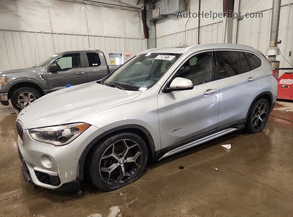WBXHT3C38G5E56512 2016 BMW X1 Серебряный 