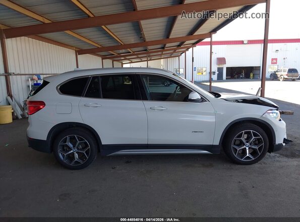 WBXHT3C38GP885053 2016 BMW X1 Белый Вид задней части салона