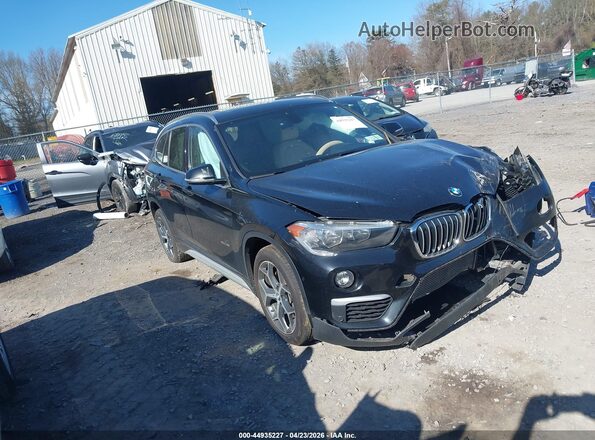 WBXHT3C38H5F73685 2017 BMW X1 Черный Передняя правая четверть