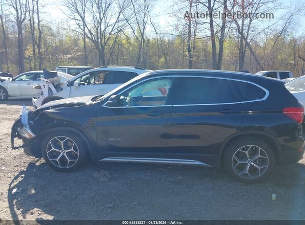 WBXHT3C38H5F73685 2017 BMW X1 Черный Вид задней части салона