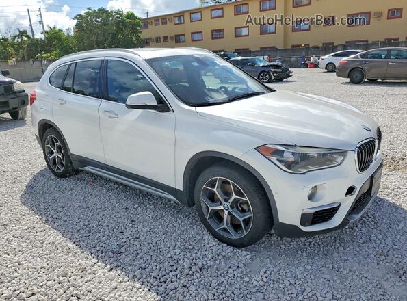 WBXHT3C38H5F75002 2017 BMW X1 Белый Передняя правая четверть