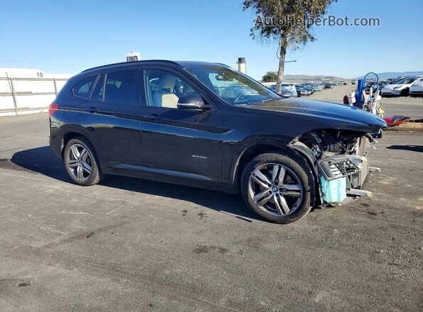 WBXHT3C39H5F73579 2017 BMW X1 Черный Передняя правая четверть