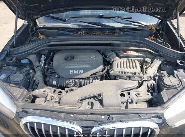 WBXHT3C39J5F93370 2018 BMW X1 Black Հետևի տեսք