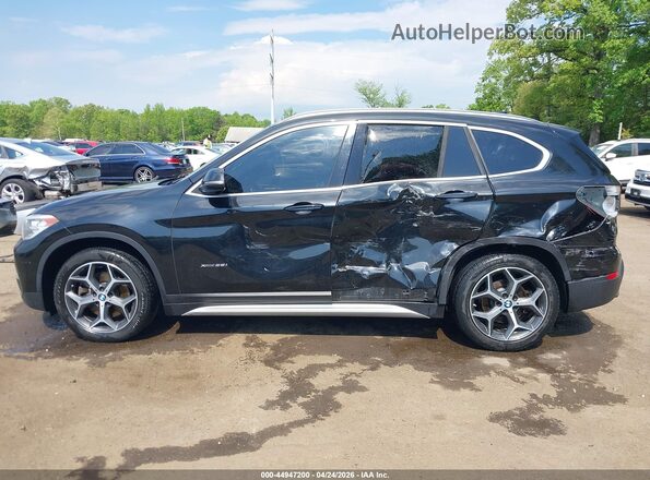 WBXHT3C39J5F93370 2018 BMW X1 Black Սալոնի 360 աստիճան տեսք
