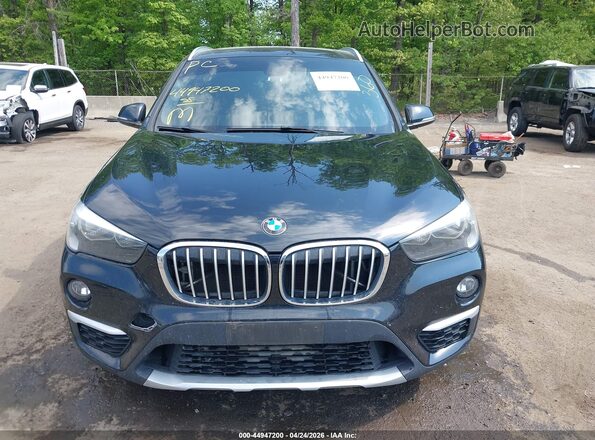 WBXHT3C39J5F93370 2018 BMW X1 Black Սարքավորումների վահանակի տեսք