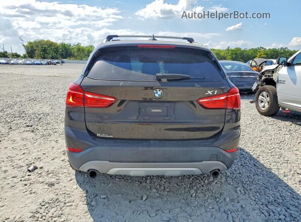 WBXHT3C3XG5E48590 2016 BMW X1 Коричневый Вид сзади