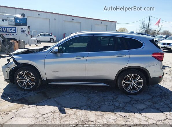 WBXHT3C3XG5E53823 2016 BMW X1 Серебряный 