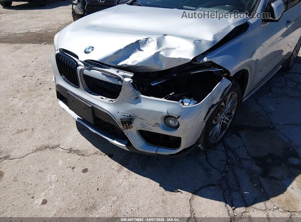 WBXHT3C3XG5E53823 2016 BMW X1 Серебряный Вид спереди
