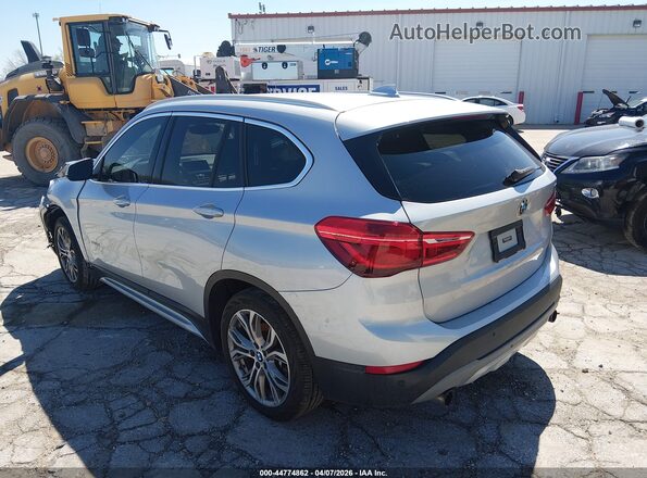 WBXHT3C3XG5E53823 2016 BMW X1 Серебряный Задняя левая четверть