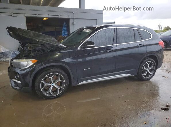 WBXHT3C3XJ5K22635 2018 BMW X1 Черный Передняя левая четверть