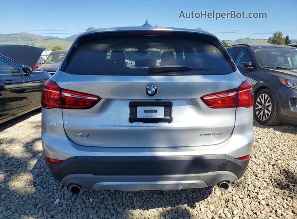 WBXHT3C52K3H36562 2019 BMW X1 Серебряный Вид сзади